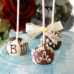 Monogrammed brownie favor pops on a stick