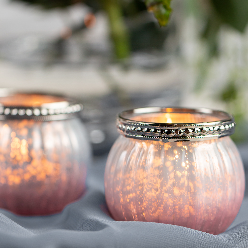 This Pink Ombre Mercury Glass Votive Candle Holder will delight your guests.  Tea light is included in a clear box tied with an organza ribbon and a tag that says 