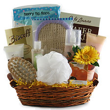 A basket filled with bath essentials to be given as a spa gift.