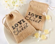 Burlap sacs with a drawstring to fill and use as a bridal shower favor.