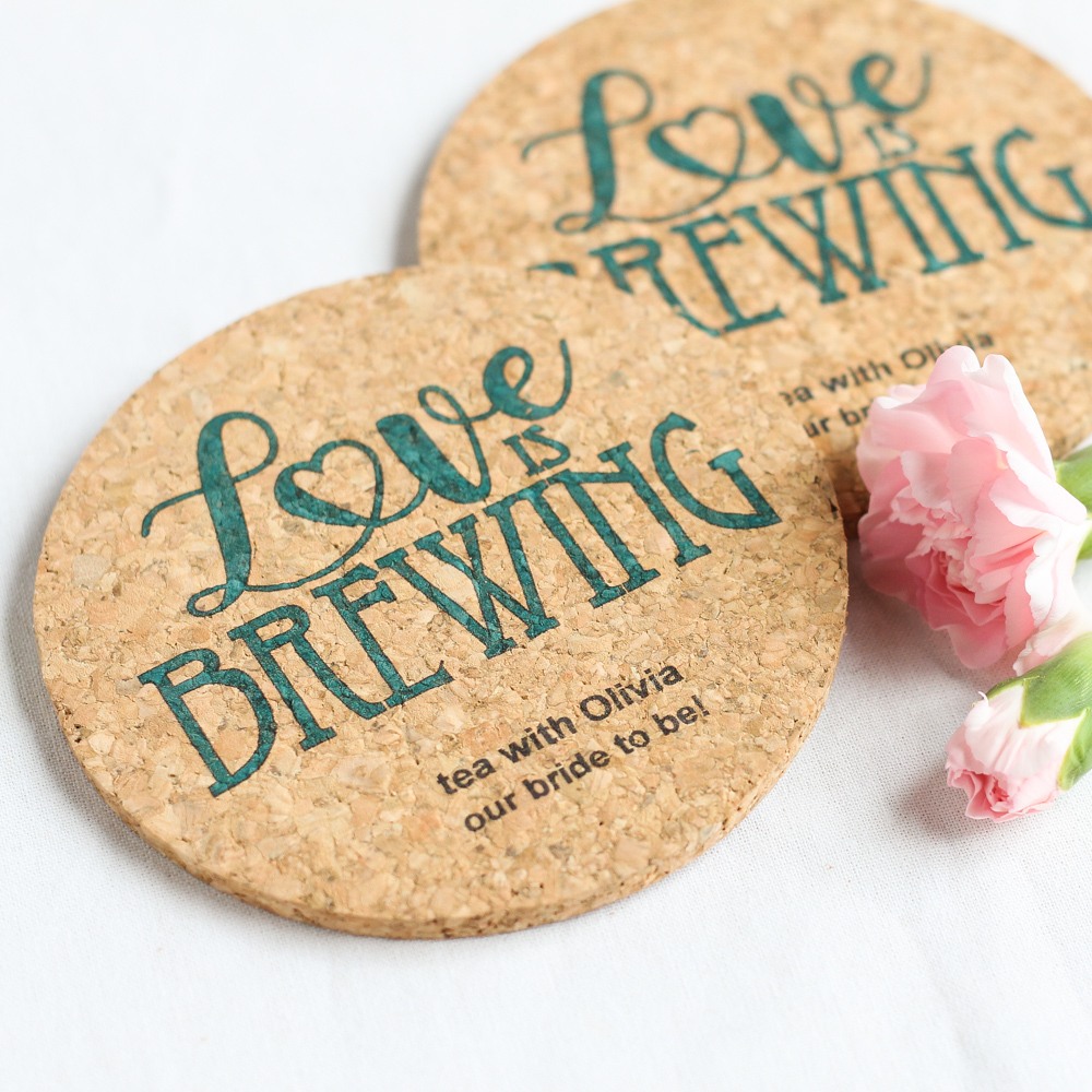 Cork coasters can be personalized with the name, date, and message for a thoughtful bridal shower favor.