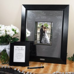 Picture frame with metal mat and engraving pen.