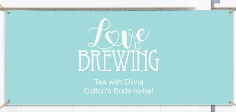 A simple blue banner with white letters for a tea themed bridal shower.