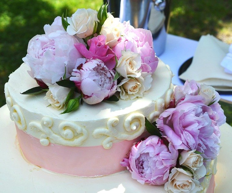 bridal shower cake with fresh flowers as topper